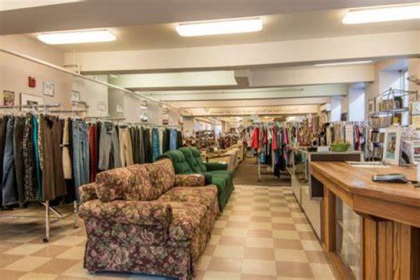 Clothes and furniture for sale in a New Hampshire thrift shop